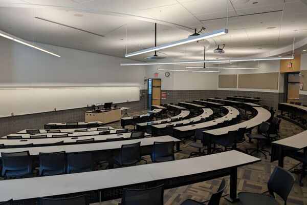 Front of room view with lectern center in front of markerboard 