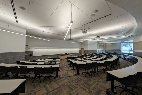 Front of room view with lectern center in front of markerboard 