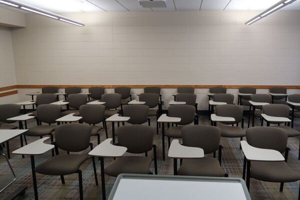 Back of room view of student tablet arm seating