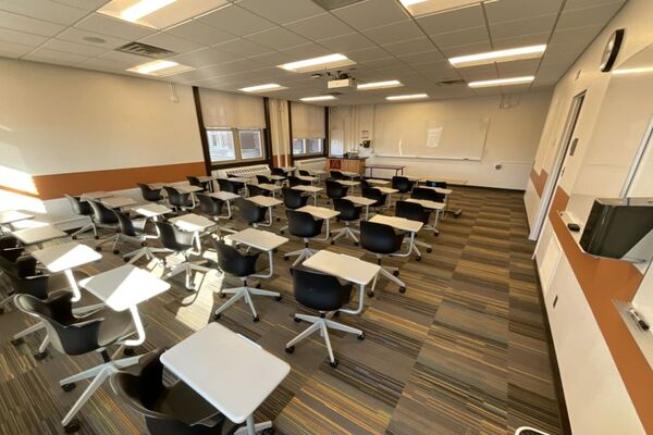  Front of room view with lectern on left in front of markerboard 