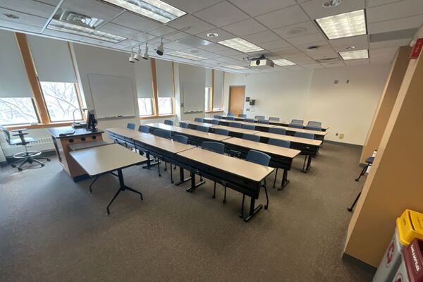 Back of room view of tables and chairs