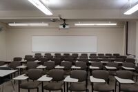 Back of room view of student tablet arm seating 