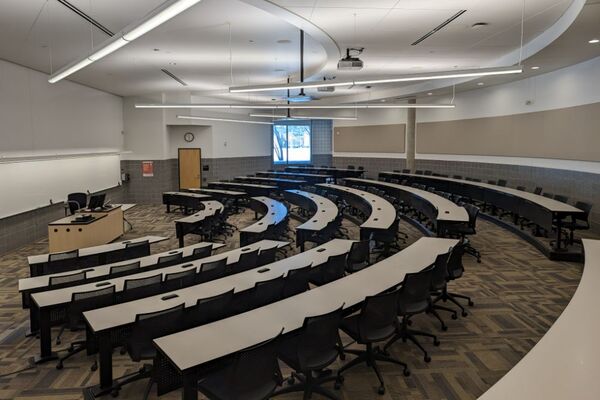 Front of room view with lectern center in front of markerboard 