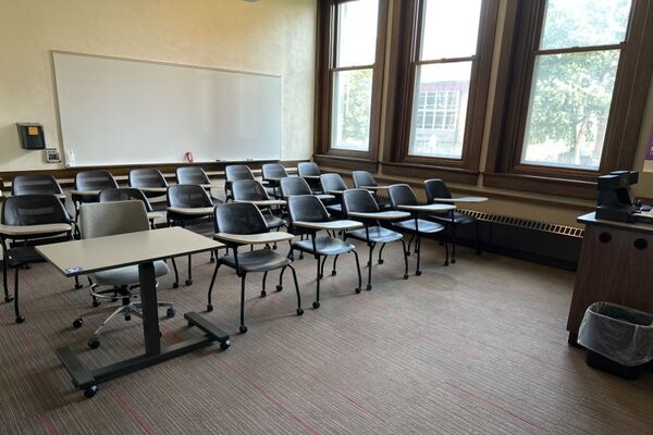 Back of room view of tables and chairs