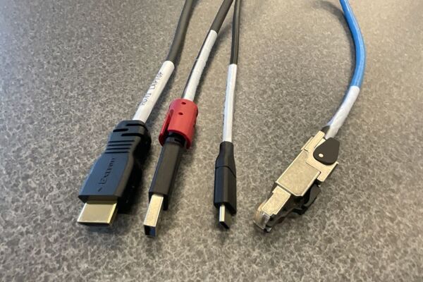 Pedestal - laptop cable connections with cables pulled out showing cable ends