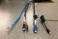 Pedestal - laptop cable connections with cables pulled out showing cable ends