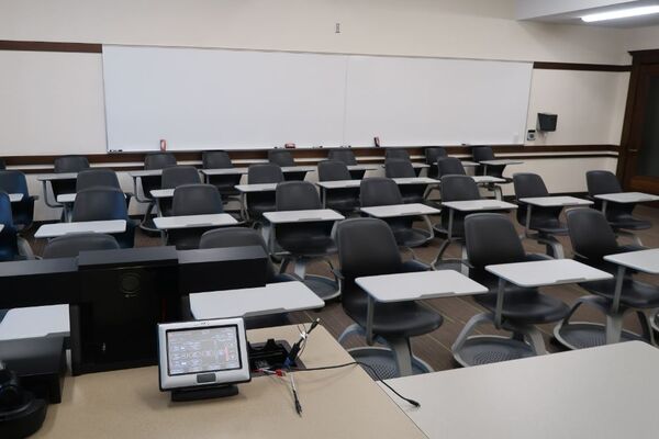 Back of room view of student tablet arm seating 