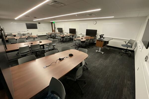 Back of room view of group table and chair seating