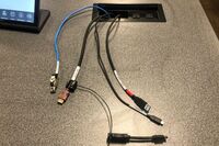 Pedestal - laptop cable connections with cables pulled out showing cable ends