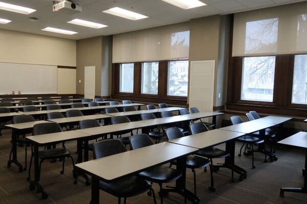 Back of room view of tables and chairs