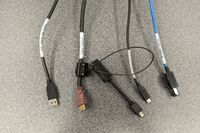 Pedestal - laptop cable connections with cables pulled out showing cable ends