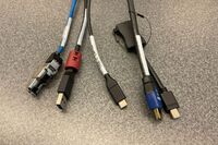 Pedestal - laptop cable connections with cables pulled out showing cable ends