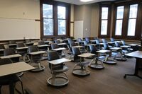 Back of room view of student tablet arm seating 