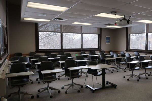 Back of room view of student tablet arm seating 